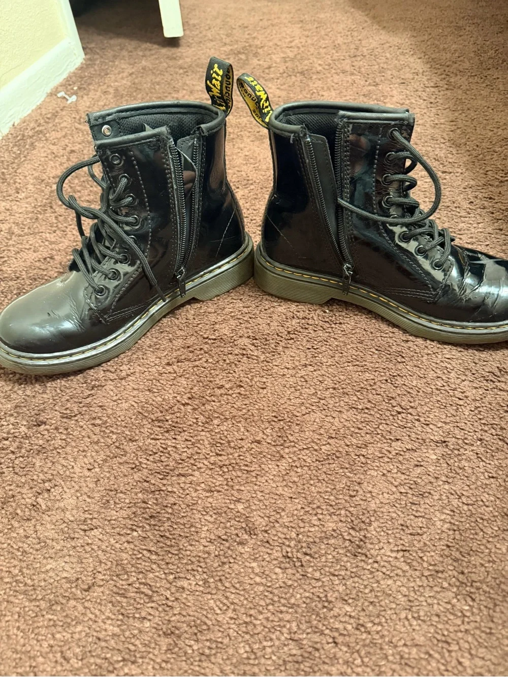 Dr. Martens Kids Black Patent Ankle Boots with Yellow Pull Loop